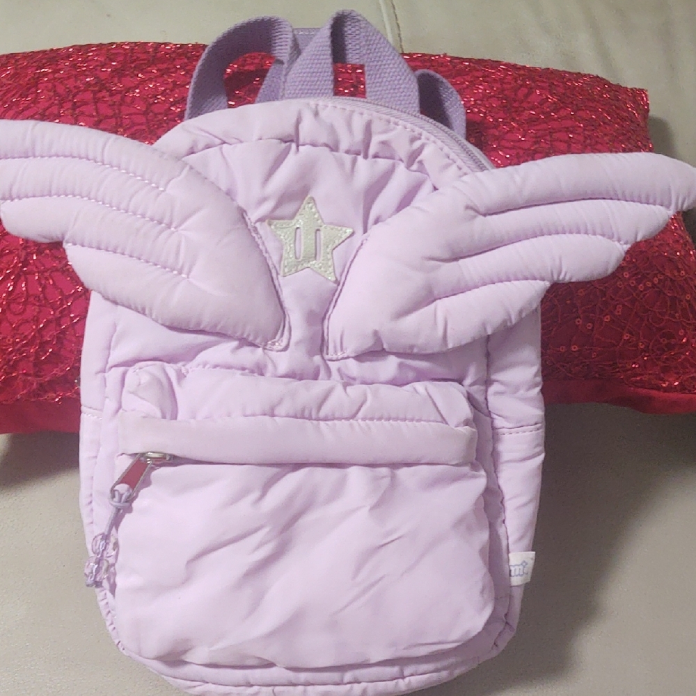SOLD.  Girl's Purple Wings Mini Backpack